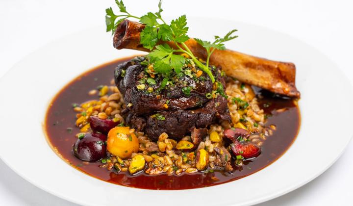 Braised Lamb Shank with Bing Cherry Pistachio Farro 